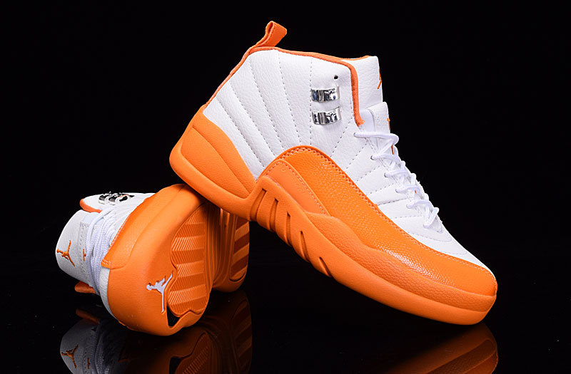 orange and white jordan 12